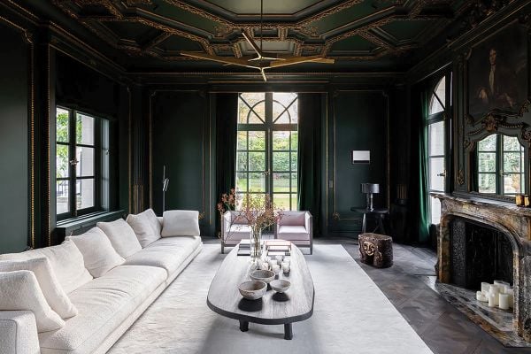 Book cover of Timeless Residences, with a pale interior hallway with stone tiled floor and two dark wood chairs with white upholstery. Published by Beta-Plus.