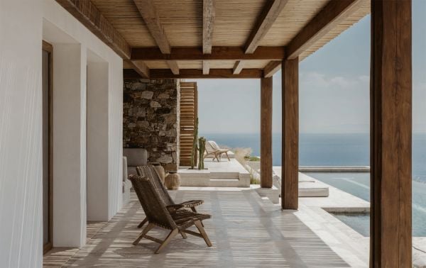 Book cover of Summer Residences, with interior living space with cream carpet, wood furniture, with double doors opening out to landscape. Published by Beta-Plus.