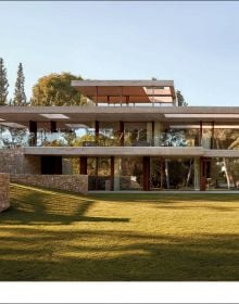 Book cover of The Essence of Contemporary Mediterranean Living: Ramón Esteve; featuring an outside residential terrace with infinity pool. Published by Beta-Plus.