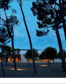 Book cover of The Essence of Contemporary Mediterranean Living: Ramón Esteve; featuring an outside residential terrace with infinity pool. Published by Beta-Plus.