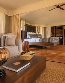 Book cover of A Warm Welcome: Quiet Luxury Hotels & Resorts: featuring a minimalist hotel interior. Published by Beta-Plus.