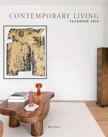 Book cover of Contemporary Living Yearbook 2026: featuring an interior with white walls, dark wood table and speaker stack. Published by Beta-Plus.