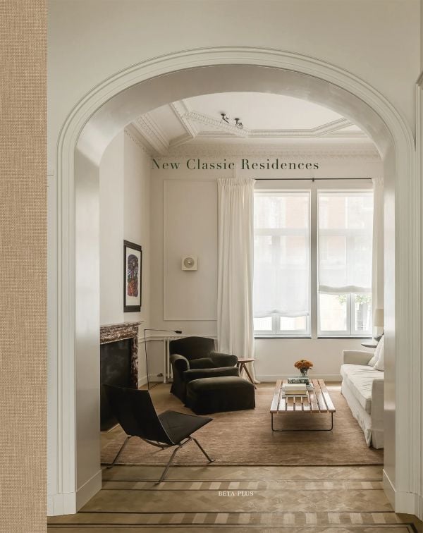 Book cover of New Classic Residences: featuring an interior living room with arched entrance. Published by Beta-Plus.