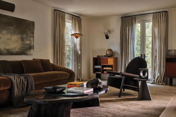 Book cover of World's Best III - 64 Interiors From Around the Globe; featuring a kitchen interior with a modern stainless steel sink island. Published by Beta-Plus.