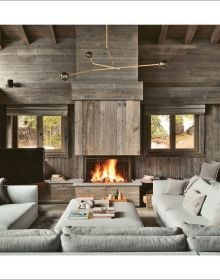 Book cover of Authentic: Atelier Giffon - Architecte d'intérieurs; with a wooden house covered in snow. Published by Beta-Plus.