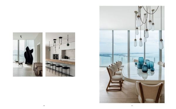 Book cover of World's Finest Homes II; featuring a modern interior living space with large dining table, and views out to a river. Published by Beta-Plus.