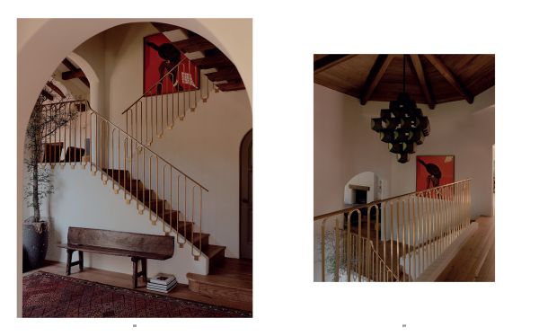 Book cover of World's Finest Homes II; featuring a modern interior living space with large dining table, and views out to a river. Published by Beta-Plus.