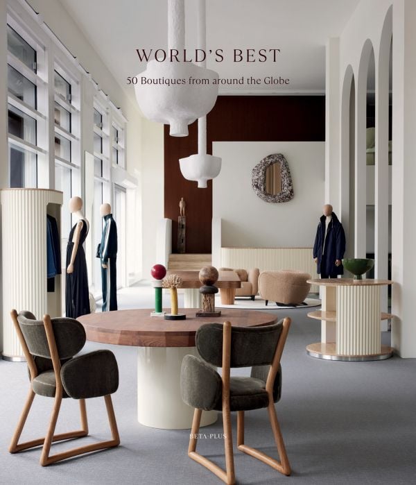 Book cover of World's Best - 50 Boutiques From Around the Globe; featuring the interior of a fashion store with clothed mannequins. Published by Beta-Plus.