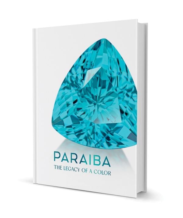 Book cover of Paraíba: The Legacy of a Color: featuring a bluish-green gemstone. Published by Watchprint.com.