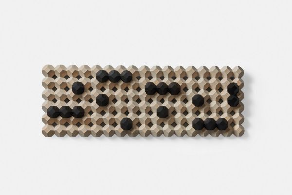 Book cover of Toshimasa Kikuchi: Mathematical Objects, with silhouette of abstract sculpture. Published by John Adamson.