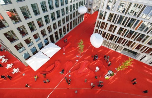 Brown cover of architecture monograph 'Carlos Martinez'. Published by Quart Publishers.