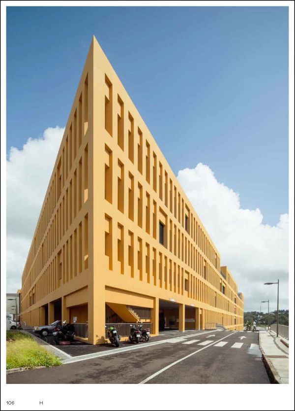 Man on white plinth taking photo of landscape, on white cover, Creatures of the City in black font above