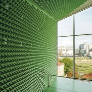 Seascape in Portugal with rocks, curved wall structures, Portugal Lessons Environmental Objects. in black font on white bottom banner