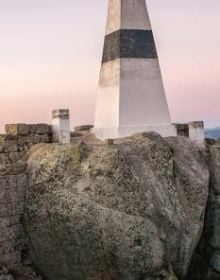 Seascape in Portugal with rocks, curved wall structures, Portugal Lessons Environmental Objects. in black font on white bottom banner