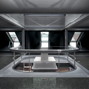 AT HOME IN STEEL Residential Construction in Steel - Thoughts on Space and Structure in brown font on white cover.