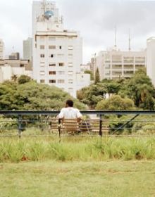 Book cover of Access for All: São Paulo's Architectural Infrastructures, with a public outdoor rooftop swimming pool with bathers, under blue sky. Published by Park Books.