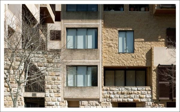 Salmon pink cover with black scale patterns and circle, Angelo Candalepas Buildings and Project in black font above and below.