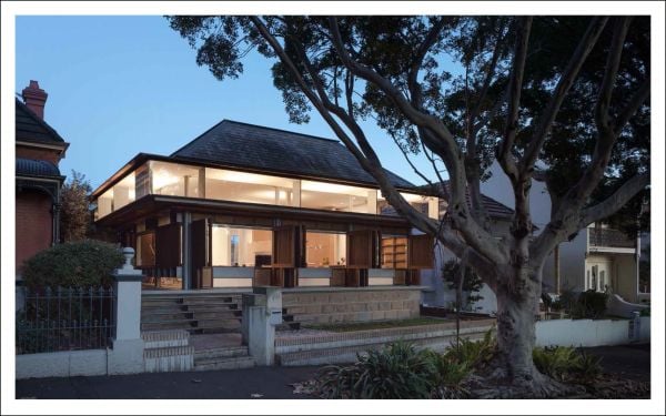 Salmon pink cover with black scale patterns and circle, Angelo Candalepas Buildings and Project in black font above and below.