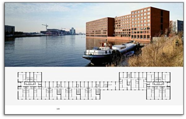 Exterior of brutalist style building, Diener & Diener Architects Housing in white and pale blue font above.