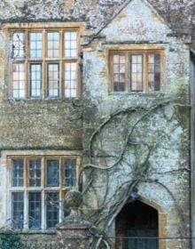 Green English landscape, white cover, Manor Lessons Commons Revisited in black font below.