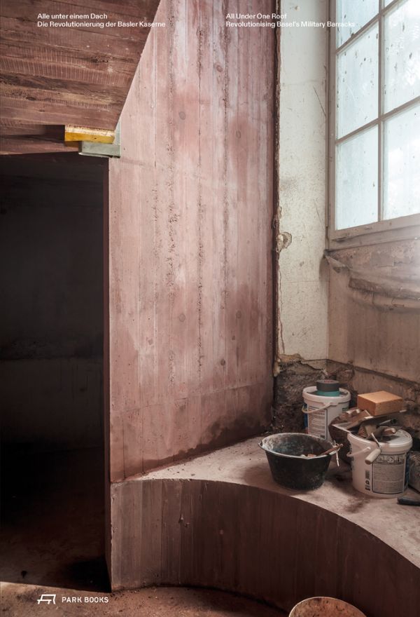 Book cover of All Under One Roof: Revolutionising Basel’s Military Barracks, with buckets of plaster and paint rollers in an interior space. Published by Park Books.