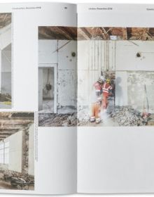 Book cover of All Under One Roof: Revolutionising Basel’s Military Barracks, with buckets of plaster and paint rollers in an interior space. Published by Park Books.