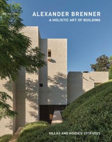 Book cover of Alexander Brenner – Villas and Houses 2015–2021: A Holistic Art of Building, with a concrete building surrounded by green trees. Published by Park Books.