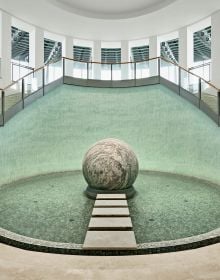 Book cover of Architekten von Gerkan, Marg und Partner, with UFO-shaped building of Palacongressi Conference Center in Italy, with water fountain in front. Published by Park Books.