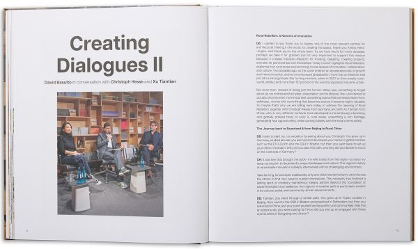 Book cover of Rural Vision: Building Dialogues Through Architecture, featuring a wood building with a person looking out onto a city, with their back to the viewer. Published by Park Books.