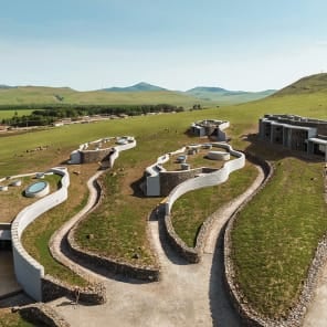 Book cover of Genuine Construction: Zhang Pengju’s New Regionalism in Inner Mongolia, featuring a modern structures surrounded by a mountainous landscape. Published by Park Books.