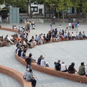 Book cover of Concéntrico: Urban Innovation Laboratory; featuring grey block-paving with red brick circles. Published by Park Books.