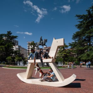 Book cover of Concéntrico: Urban Innovation Laboratory; featuring grey block-paving with red brick circles. Published by Park Books.