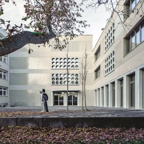 Book cover of New Schools on the Block: School Buildings—A Typological Inventory. Published by Park Books.