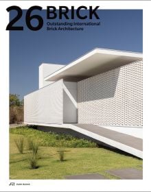 Book cover of Brick 26: Outstanding International Brick Architecture; featuring a modern white brick building with perforated panels and geometric forms. Published by Park Books.
