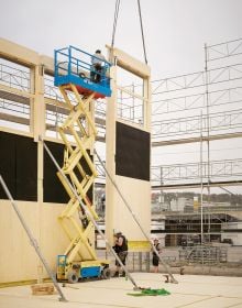 Book cover of Building for Disassembly: Temporary Timber Sports Halls; featuring a large, timber frame for side of building. Published by Park Books.