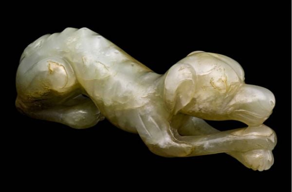 Book cover of Forever Jade: Chinese Jade Miniatures from Four Millennia, with a sculptured jade animal ornament. Published by Scheidegger & Spiess.