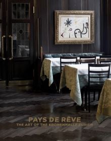 Book cover of Pays de rêve: The Art of the Kronenhalle Zurich, with a restaurant interior with a framed abstract painting on wall. Published by Scheidegger & Spiess.