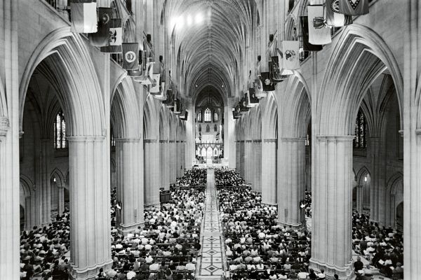 Book cover of Dalai Lama: Photographs by Manuel Bauer. 1990-2024: featuring a portrait of the head of Tibetan Buddhism. Published by Scheidegger & Spiess.