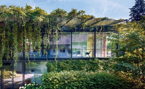 Book cover of The Ricola Collection: The Ricola Collection Present and Past, featuring an office space with marble staircase. Published by Scheidegger & Spiess.