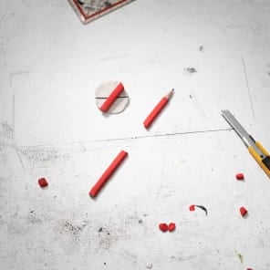 Book cover of Studio: Blending Model With Reality. Published by Scheidegger & Spiess.