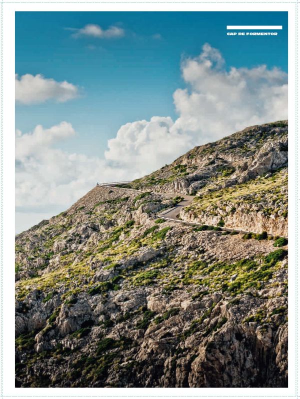 Curved road with mountainous landscape behind, on cover of 'Curves: Mallorca', by Delius Klasing.