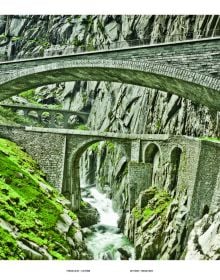 High angle shot of Swiss Alps with winding roads, on cover of 'Porsche Drive - Pass Portrait - Gotthard, Schweiz - Switzerland - 2106 m', by Delius Klasing.