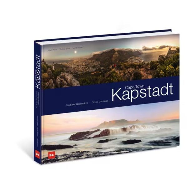 Book cover of Cape Town, City Full of Contrasts, with a mountainous landscape, and seascape below. Published by Delius Klasing Verlag GmbH.