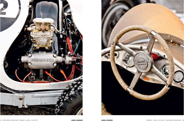 Cream Porsche 356 with small boat on roof rack traveling on road with mountains behind, on cover of 'Cars & Curves Vol.2', by Delius Klasing Verlag GmbH.