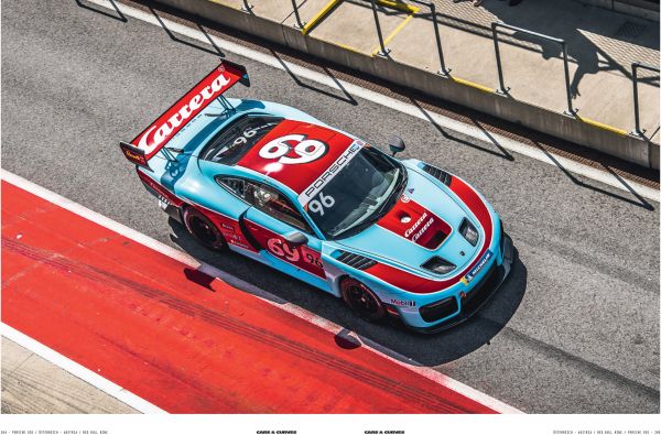 Cream Porsche 356 with small boat on roof rack traveling on road with mountains behind, on cover of 'Cars & Curves Vol.2', by Delius Klasing Verlag GmbH.