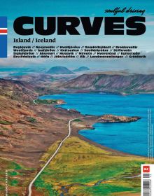 Mountainous landscape with lake and winding road in distance, on cover of 'Curves: Iceland, Volume 16', by Delius Klasing Verlag GmbH.