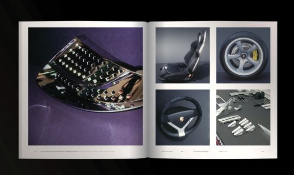 Book cover of Porsche Carrera GT, with a gray sportscar driving on roads around mountainous landscape. Published by Delius Klasing Verlag GmbH.