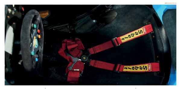 Book cover of World Championship Cars: Michael Schumacher, with side profile of the front end of a F1 red Ferrari. Published by Delius Klasing.