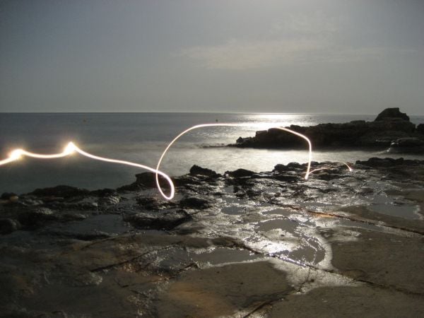 Book cover of Claudia Schmitz: Invisyllables, with a mountainous landscape inside. Published by Kerber.