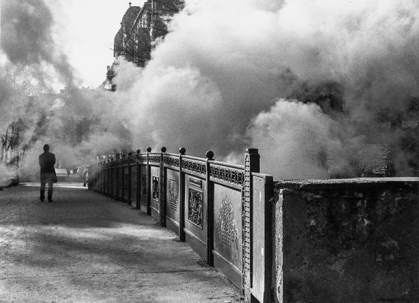 Book cover of The Presence of Something Past: Ulrich Wüst Photographs, with a residential street. Published by Kerber.